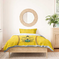Yellow comforter set with two pillowcases, crest band, black star, and “YOUR TEXT”