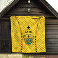 Yellow quilt under porch roof, black star and Ghana crest with 'YOUR TEXT'.