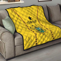 Yellow quilt on sofa, black star and Ghana crest beneath 'YOUR TEXT', red star border.