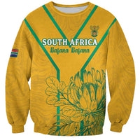 Yellow soccer sweatshirt with green V trim; “SOUTH AFRICA” “Bafana Bafana” front print.