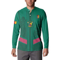 Green button sweatshirt with collar, Cameroon crest, and center skyline graphic.