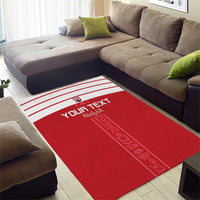 Red custom area rug featuring white stripes, "YOUR TEXT" text and pharaoh design
