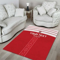 Red custom area rug with white stripe accents, "YOUR TEXT" and pharaoh symbols