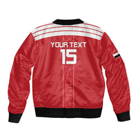 Red bomber jacket back with black collar and ribbed hem, YOUR TEXT 15 graphic