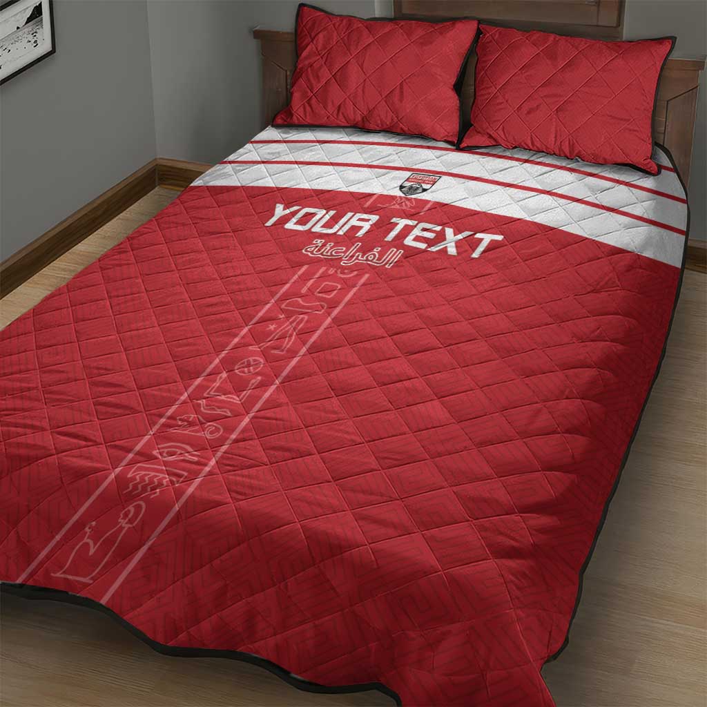 Red quilt bed set with white stripe band and 'YOUR TEXT' center print; two pillows
