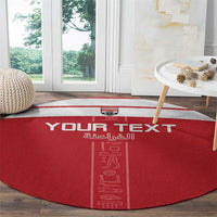 Red round football rug with YOUR TEXT and vertical pharaoh hieroglyph design
