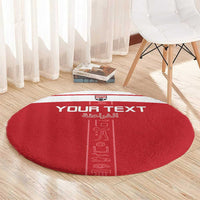 Round red football rug with YOUR TEXT and light red pharaoh hieroglyph divider
