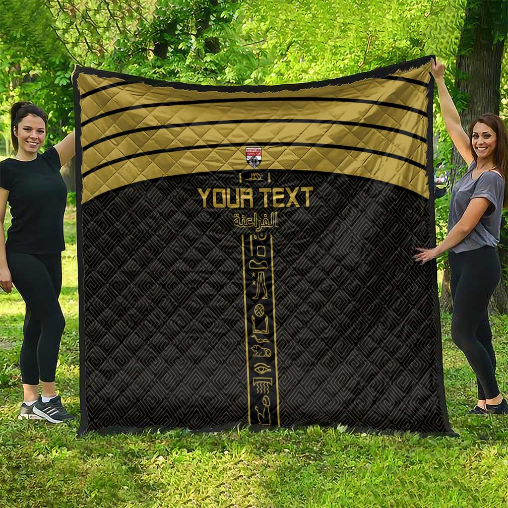 Black and gold custom football quilt with vertical emblem and gold striped top