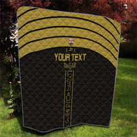 Black custom football quilt with gold stripes and vertical pharaoh-style emblem center