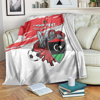 Custom football blanket with red-and-white flag design, shield, and soccer player art