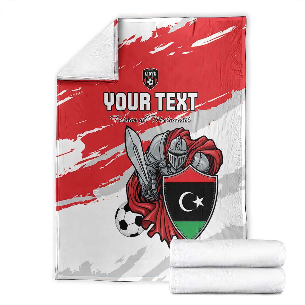 Custom football blanket folded with red-and-white flag design, shield emblem, and soccer player