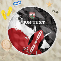 Round fringe beach blanket in black, white, red with surfboard and Kenya shield design