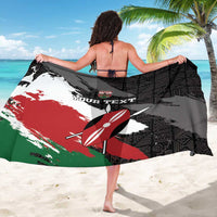 Black sarong with geometric pattern, surfboard icon, and YOUR TEXT design