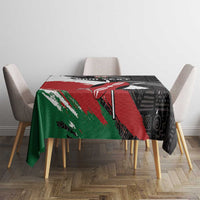 Black tablecloth with red diagonal graphic and green brush-stroke pattern