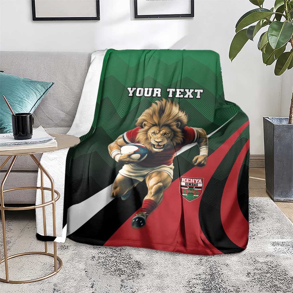 Green custom rugby blanket with lion mascot graphic and red black white stripes on chair