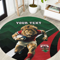 Round green rugby style carpet with lion graphic, red/black chevrons, and badge patch