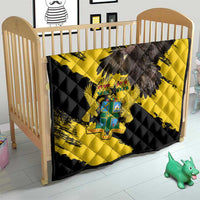 Ghana eagle quilt blanket on baby crib, black-and-yellow diagonal eagle design