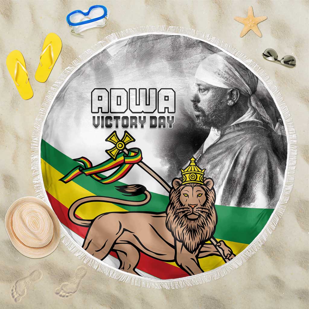 Round white beach blanket with fringe edge and Adwa Victory Day graphic portrait.