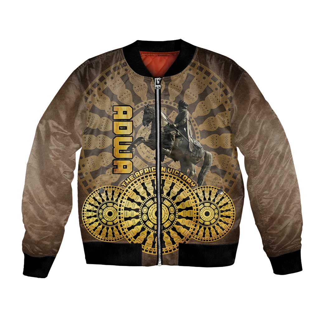 Brown unisex bomber jacket with full-zip front and gold/black African victory graphic.