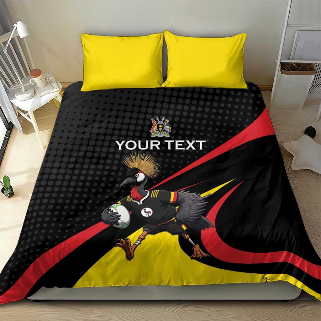 Black and yellow rugby bedding set with two yellow pillows and crowned crane mascot graphic