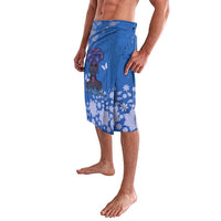 Blue printed lavalava skirt with elastic waistband and floral face graphic, side view