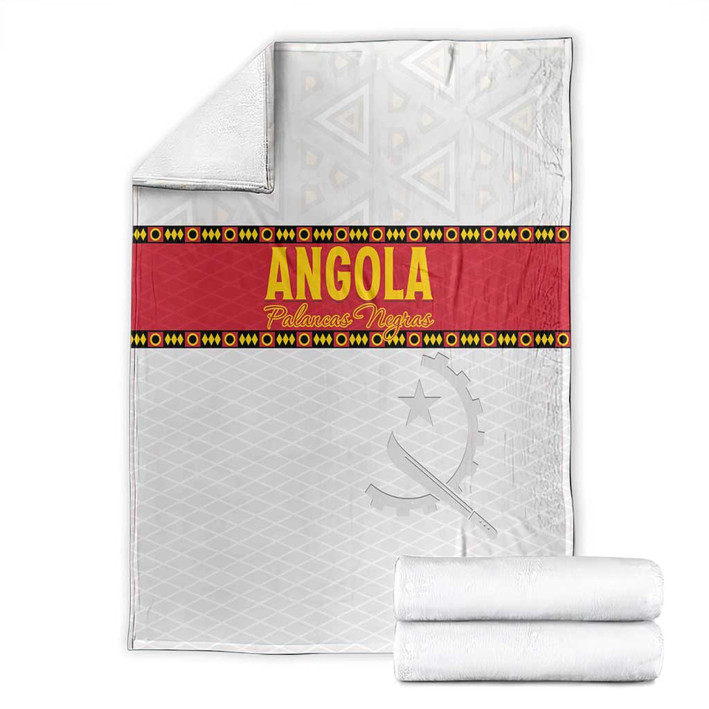 Angola football blanket with red center, star and moon print; folded with rolled stack