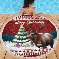Round red beach blanket with fringe edge, moose centerpiece and snowy fir tree print