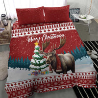 Red Christmas bedding set on bed with two pillowcases and moose front panel