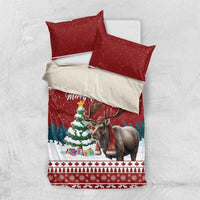 Red Christmas bedding set with two pillowcases and duvet showing moose holiday artwork