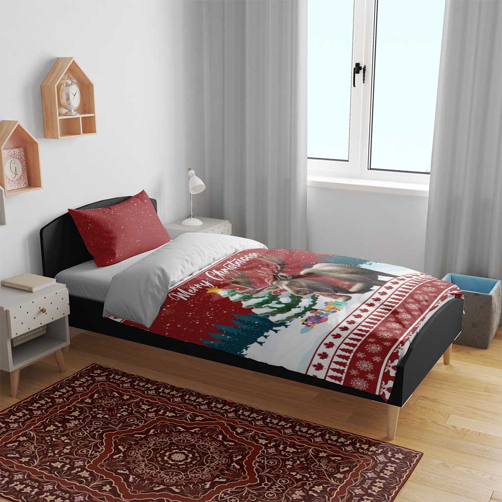 Red Christmas bedding set on bed with duvet and pillows featuring moose holiday graphic