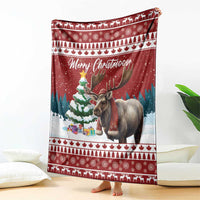 Red Christmas blanket with reindeer, 'Merry Christmoose' script, and festive tree stripes