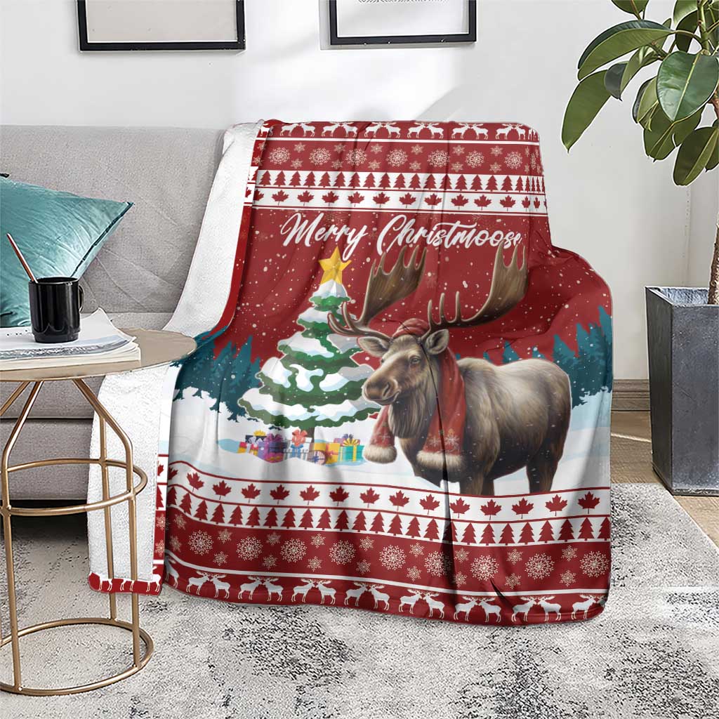 Red Christmas blanket with reindeer image on sofa, festive stripes and 'Merry Christmoose'
