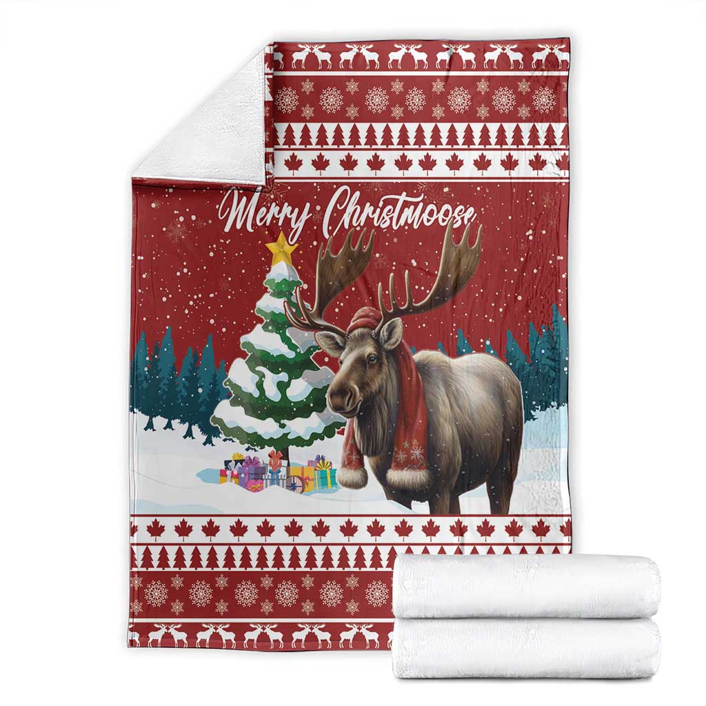 Red Christmas blanket folded stack with reindeer scene and 'Merry Christmoose' script