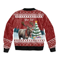 Red Christmas bomber jacket with moose back graphic, holiday scene, black ribbed hem