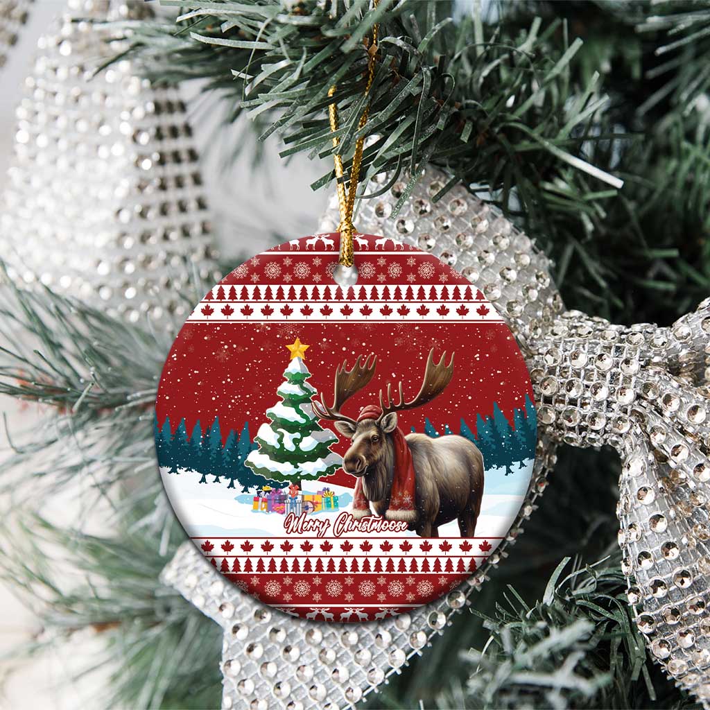 Red ceramic circle ornament with reindeer, Christmas tree, and gold hanging cord