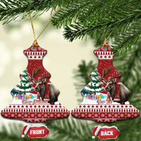 Red ceramic bell ornament with reindeer and tree artwork, gold hanger, front/back tags