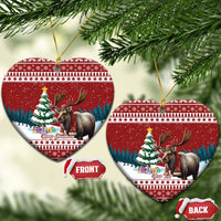Red ceramic heart ornament with reindeer and Christmas tree scene, gold hanger, front/back tags