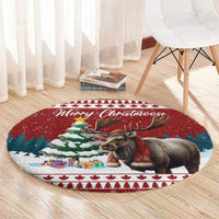 Red round Christmas rug with moose in a scarf, Merry Christmoose script, gifts and tree border
