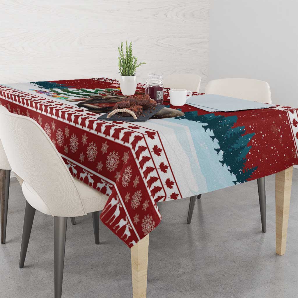 Red and teal Christmas tablecloth with pine tree and snowflake motifs