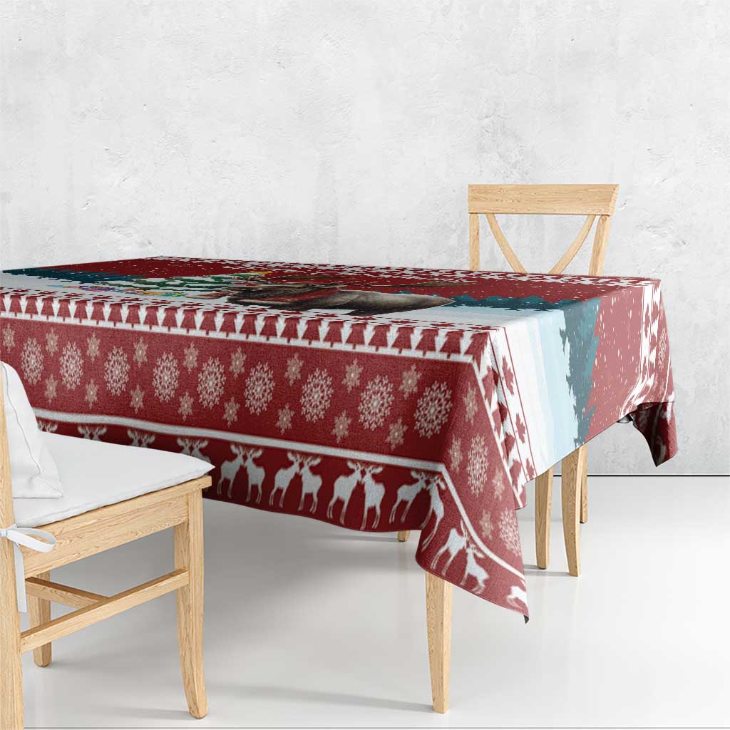 Red Christmas tablecloth with reindeer silhouette border and snowflake pattern