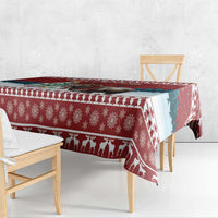 Red Christmas tablecloth with reindeer silhouette border and snowflake pattern