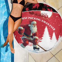 Round Christmas beach blanket with Santa hockey graphic, fringe border, red and white