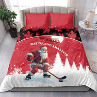 Red Christmas bedding set with Santa hockey player, pine trees and large crescent moon, two pillows
