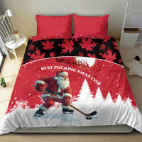 Red Christmas bedding set with Santa hockey player, pine trees, crescent moon and starry accents, two pillows