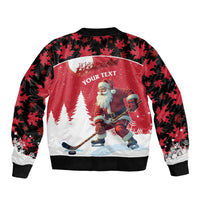 Zip-up bomber jacket with red holiday scene, Santa ice hockey graphic, and leaf camo sleeves