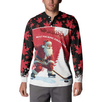 Red and black Santa hockey player Christmas button sweatshirt worn by a man