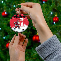 Personalized red Santa hockey ceramic ornament, circle with hanging gold loop
