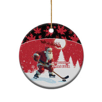 Personalized red Santa hockey ceramic ornament, circle shape with gold hanging string
