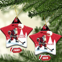 Personalized red Santa hockey ceramic ornament, star-shaped with front and back tags