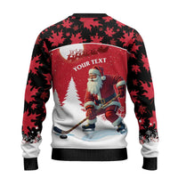 Red and black ugly Christmas sweater back view with Santa hockey player and snowy tree scene